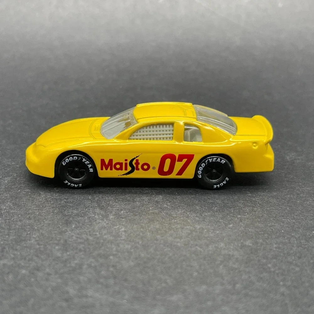 Maisto Chevrolet Chevy Monte Carlo Race Car #7 Yellow Diecast 1/64 Scale Loose